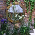 octag mirror in garden